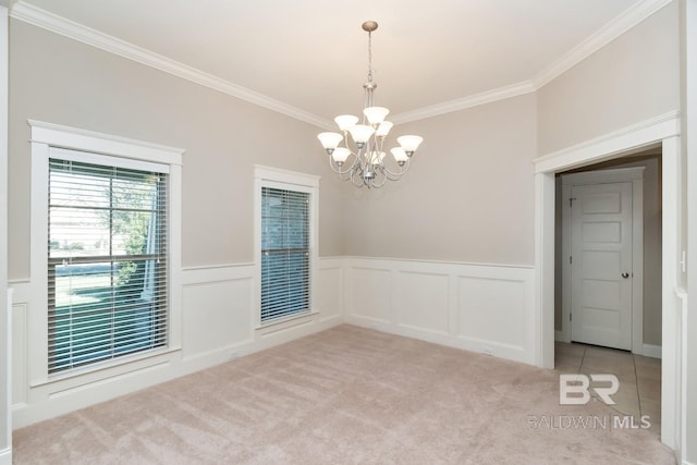 unfurnished room with light carpet, crown molding, and a chandelier