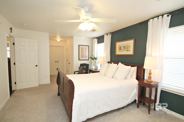 7920 Eagle Creek Dr, Daphne, AL 36526 - bedroom featuring light carpet, baseboards, ceiling fan, and a closet