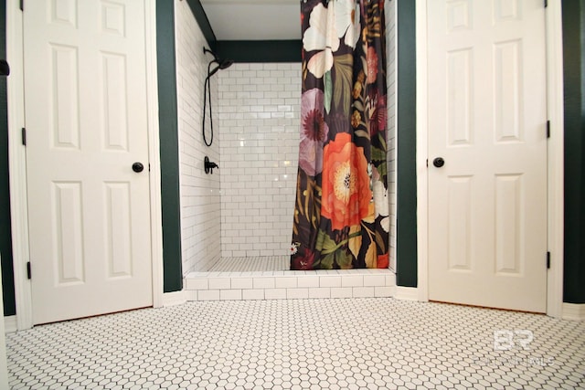 7920 Eagle Creek Dr, Daphne, AL 36526 - full bathroom featuring a shower stall and tile patterned flooring