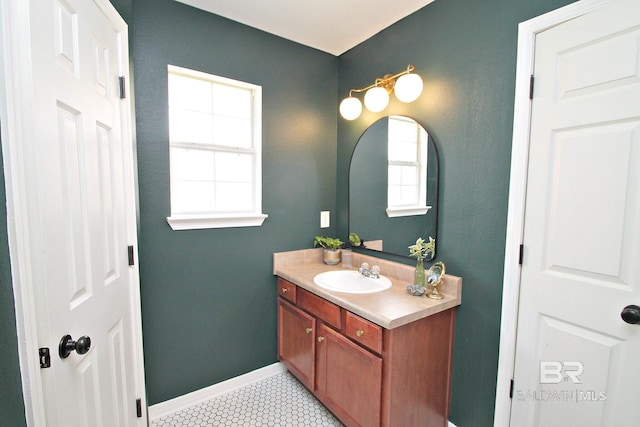 7920 Eagle Creek Dr, Daphne, AL 36526 - bathroom with vanity, baseboards, and tile patterned floors