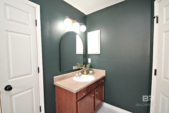 7920 Eagle Creek Dr, Daphne, AL 36526 - bathroom with vanity, tile patterned floors, and baseboards