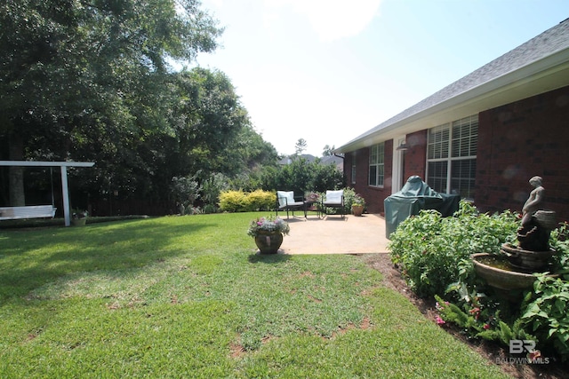 7920 Eagle Creek Dr, Daphne, AL 36526 - view of green lawn with a patio area
