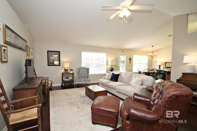 7920 Eagle Creek Dr, Daphne, AL 36526 - living room featuring wood finished floors, a chandelier, ceiling fan, vaulted ceiling, and baseboards