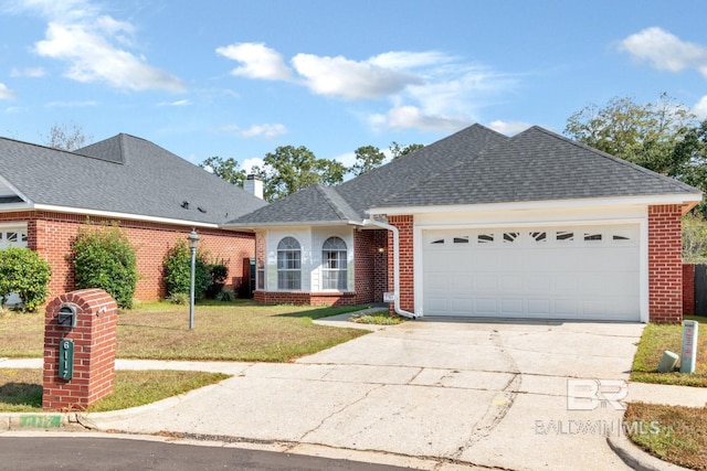ranch-style house featuring driveway, brick siding, an attached garage, roof with shingles, and a front lawn