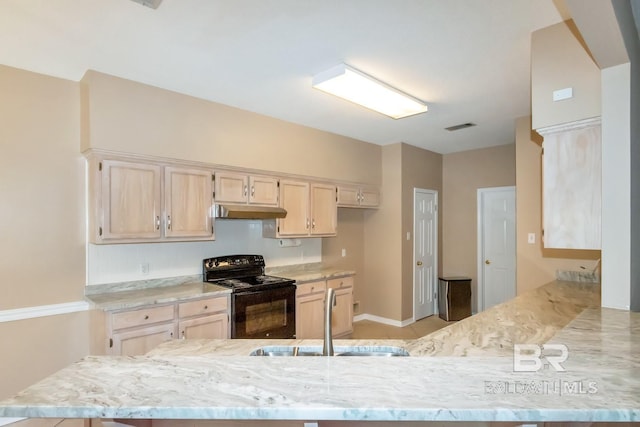 kitchen with a sink, black range with electric stovetop, visible vents, under cabinet range hood, and light stone counters