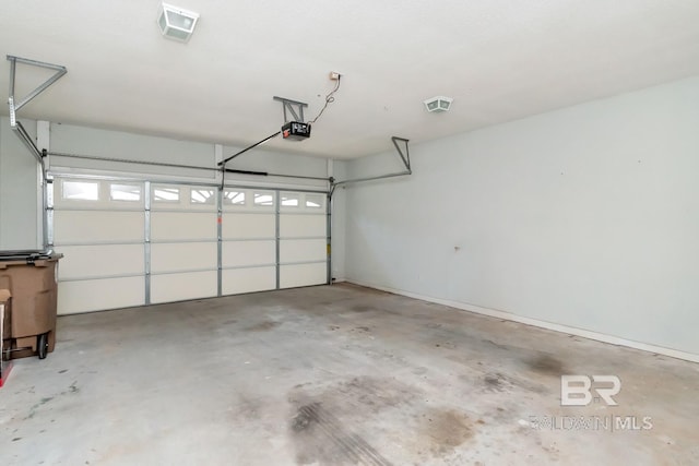 garage featuring a garage door opener