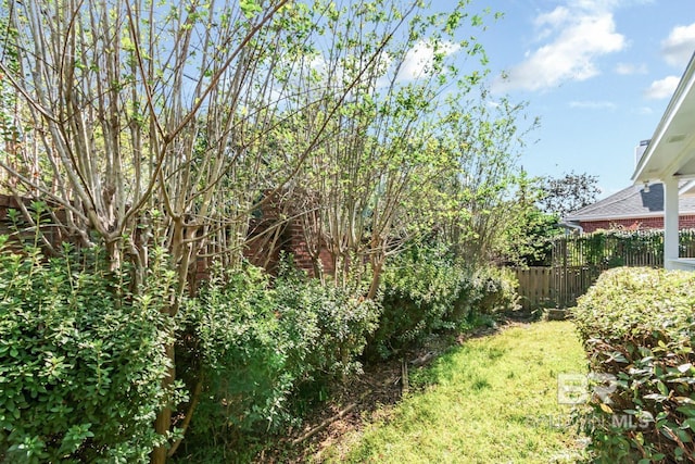 view of yard with fence