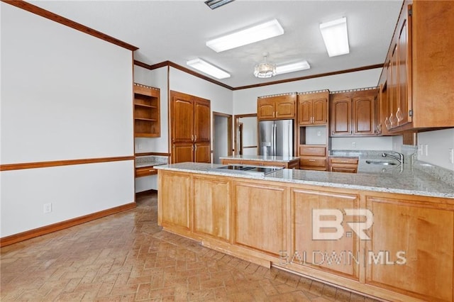 kitchen featuring kitchen peninsula, light stone counters, crown molding, stovetop, and stainless steel fridge with ice dispenser