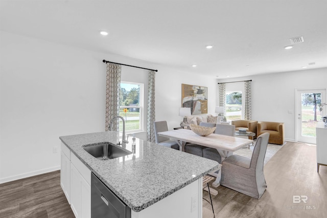 13729 Shea Cir, Foley, AL 36535 - kitchen featuring a sink, stainless steel dishwasher, a center island with sink, wood finished floors, and recessed lighting