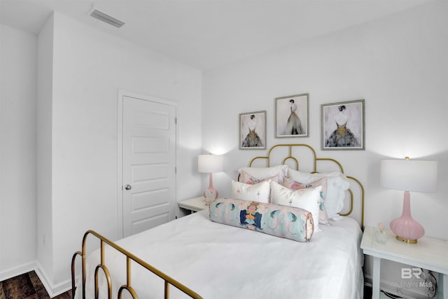 13729 Shea Cir, Foley, AL 36535 - bedroom featuring baseboards and dark wood-type flooring