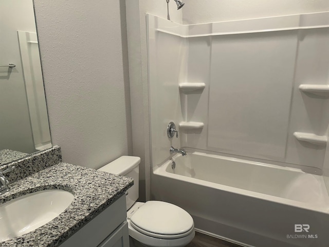 13729 Shea Cir, Foley, AL 36535 - full bathroom with a textured wall, toilet, shower / bath combination, and vanity