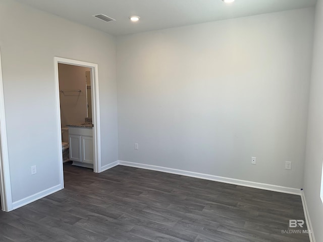 13729 Shea Cir, Foley, AL 36535 - empty room featuring dark wood-style flooring, baseboards, and recessed lighting
