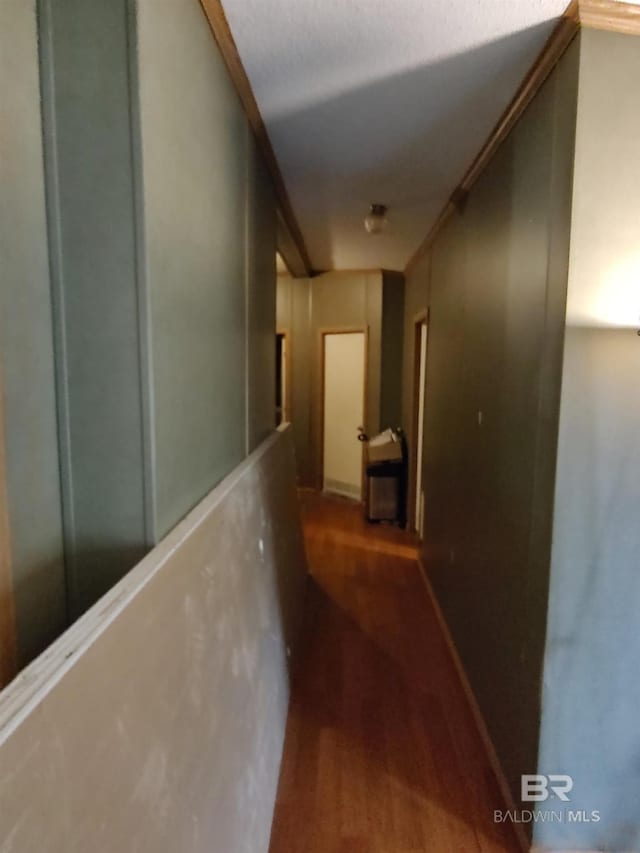 corridor featuring hardwood / wood-style flooring