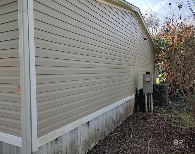 view of side of property featuring cooling unit