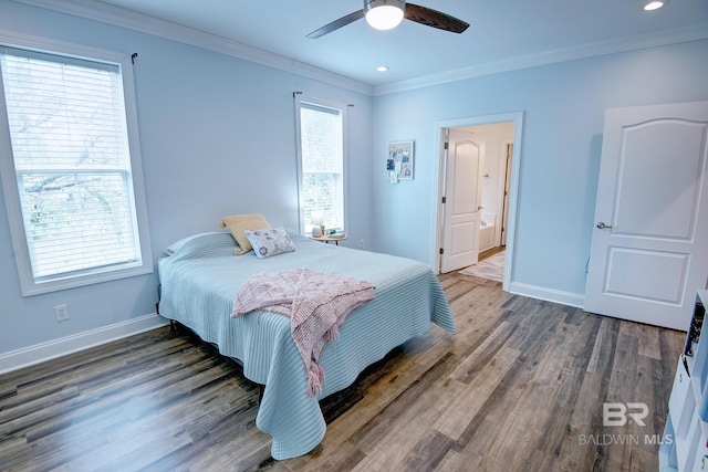 bedroom featuring ornamental molding, dark wood-type flooring, and ceiling fan