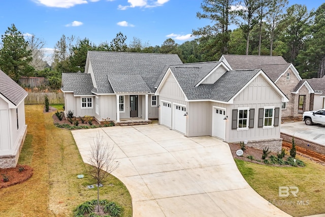 modern farmhouse featuring a front yard