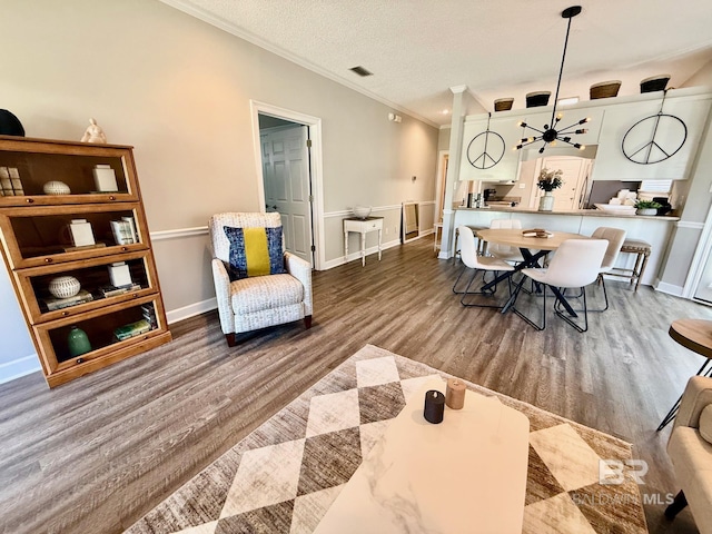 33 Cottage Dr, Fairhope, AL 36532 - living area featuring crown molding and wood finished floors