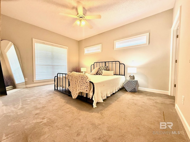 33 Cottage Dr, Fairhope, AL 36532 - carpeted bedroom with ceiling fan and a textured ceiling
