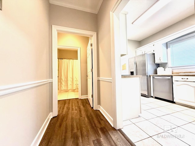 33 Cottage Dr, Fairhope, AL 36532 - corridor featuring light wood-style floors and ornamental molding