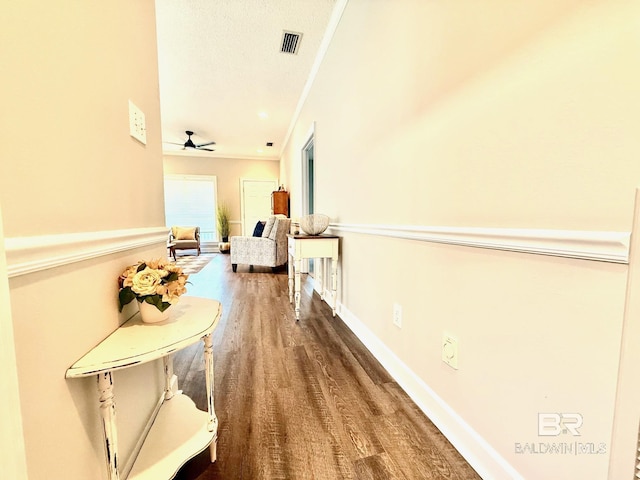 33 Cottage Dr, Fairhope, AL 36532 - hallway with wood finished floors and ornamental molding