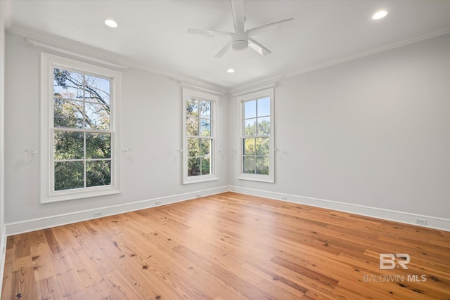 unfurnished room with crown molding, ceiling fan, and hardwood / wood-style flooring