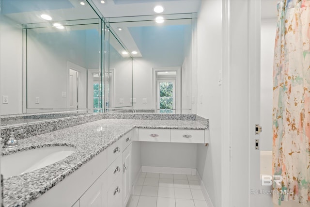 bathroom with vanity and tile patterned floors