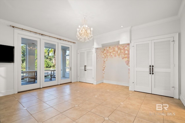 interior space with an inviting chandelier, light tile patterned floors, and ornamental molding