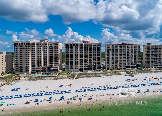 bird's eye view with a view of the beach and a water view