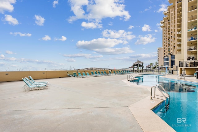 24160 Perdido Beach Blvd Unit 2073, Orange Beach, AL 36561 - view of swimming pool with a patio