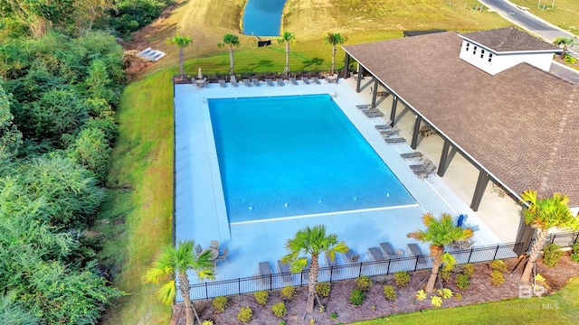 22120 Early Dawn Cir, Foley, AL 36535 - view of pool with fence and a water view