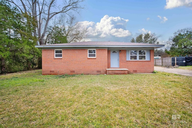 single story home with a front yard