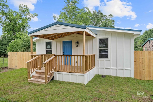 1096 S Pine St, Loxley, AL 36551 - view of front of property with board and batten siding