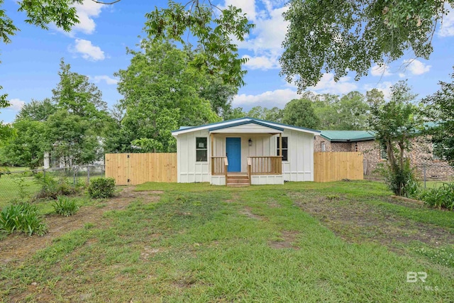1096 S Pine St, Loxley, AL 36551 - view of front of home featuring board and batten siding