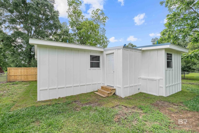1096 S Pine St, Loxley, AL 36551 - back of house with entry steps and board and batten siding