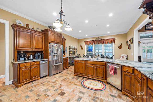 kitchen with crown molding, stainless steel appliances, light stone counters, and a wealth of natural light