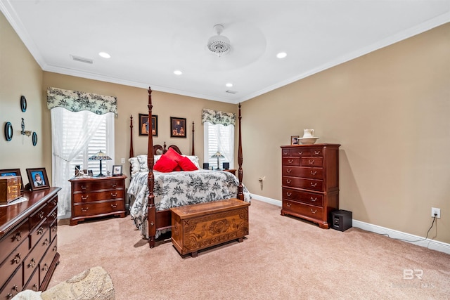 carpeted bedroom with multiple windows, ornamental molding, and ceiling fan