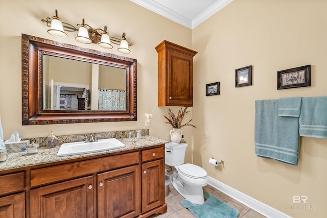 bathroom with ornamental molding, toilet, tile patterned flooring, and vanity