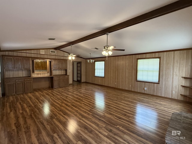 215 W Palm Ave, Foley, AL 36535 - unfurnished living room featuring ceiling fan, dark wood finished floors, and wood walls