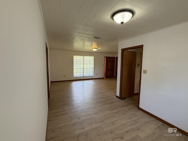 215 W Palm Ave, Foley, AL 36535 - empty room with baseboards and light wood-style flooring