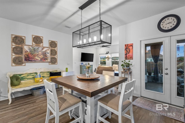 4142 Montague Dr, Gulf Shores, AL 36542 - dining room featuring wood finished floors, ceiling fan, and french doors