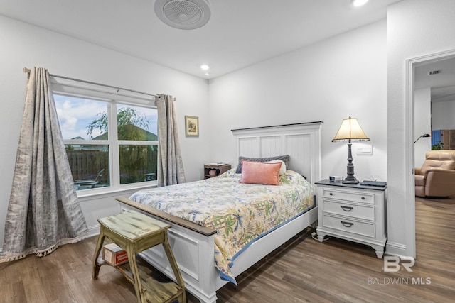4142 Montague Dr, Gulf Shores, AL 36542 - bedroom with dark wood-style floors, baseboards, and recessed lighting