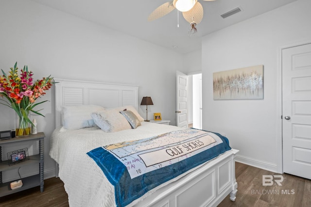 4142 Montague Dr, Gulf Shores, AL 36542 - bedroom with dark wood-type flooring, baseboards, and a ceiling fan