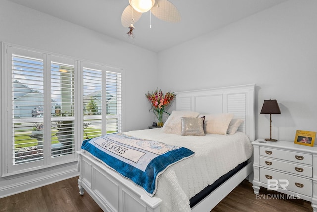 4142 Montague Dr, Gulf Shores, AL 36542 - bedroom featuring dark wood-type flooring and ceiling fan