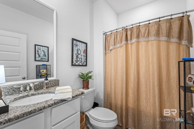 4142 Montague Dr, Gulf Shores, AL 36542 - bathroom with vanity and toilet