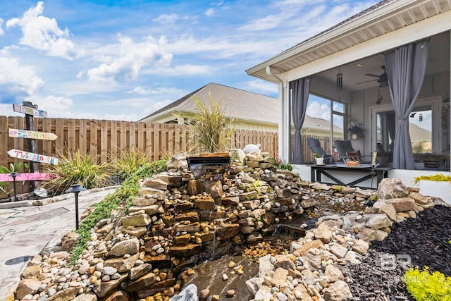 4142 Montague Dr, Gulf Shores, AL 36542 - view of patio / terrace with fence and ceiling fan