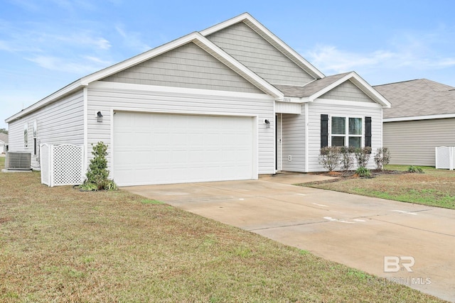 view of front facade with a front lawn, central AC unit, and a garage