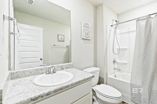 full bathroom with shower / bath combo with shower curtain, vanity, and toilet