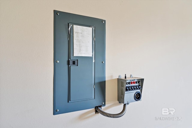 utility room featuring electric panel