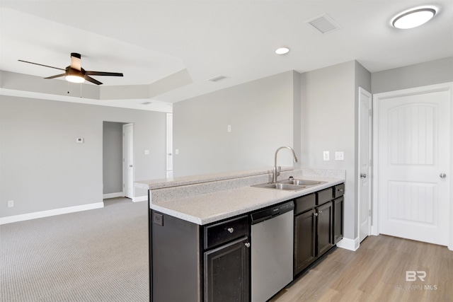 16529 Cold Mill Loop, Foley, AL 36535 - kitchen featuring dishwasher, light countertops, a peninsula, ceiling fan, and open floor plan