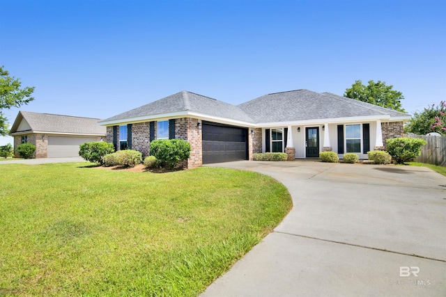 16529 Cold Mill Loop, Foley, AL 36535 - ranch-style house with brick siding, an attached garage, driveway, and a shingled roof